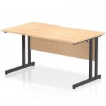 The image shows a modern office desk with a rectangular, scalloped edged maple top and sleek black cantilever legs. This desk is part of the Impulse collection and measures 1400 x 800mm. Perfect for a dynamic and stylish workspace.
