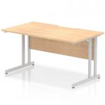 This photo shows a dynamic rectangular desk with an Impulse 1400 x 800mm scalloped edge and a straight office desk with a maple top. The desk is supported by a silver cantilever leg, providing a sleek and modern look.