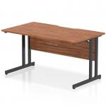 This dynamic rectangle desk has a trendy scalloped edge and comes in a sleek walnut top with black cantilever legs. The 1400 x 800mm size makes it perfect for any modern office.