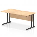 The picture features a dynamic rectangle desk with scalloped edges, measuring 1600 x 800mm. The maple top contrasts with the black cantilever leg, giving it a sleek and modern look. Perfect for any office space.