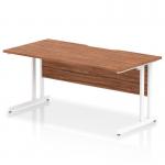 The dynamic rectangle desk appears sleek and modern with a scalloped edge, featuring a walnut tabletop and clean white cantilever leg. Perfect for any office space, this desk measures 1600 x 800mm and adds a touch of sophistication to any work environment.