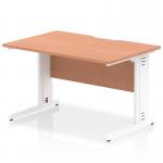 This photo showcases a spacious, modern desk with a beech top and white cable managed legs. The scalloped edge adds a touch of elegance to the design, while the dynamic cable management system keeps wires neat and organized. Perfect for any office space.