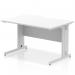 This image features a modern and sleek white office desk measuring 1200 x 800mm. The desk has a scalloped edge and a silver cable managed leg for a clean and organized workspace.