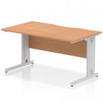 The photo shows a sleek and modern Dynamic Cable Managed Desk, measuring 1400 x 800mm with a scalloped edge design. The oak top and silver cable managed leg give it a sophisticated look. Ideal for any office space.