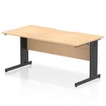 This image shows a modern office desk with a scalloped edge and a black cable managed leg. The desk is 1600 x 800mm and has a maple top. It is part of the Dynamic Cable Managed Desks Impulse collection.