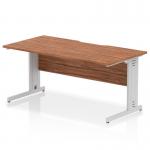 The picture shows a sleek and modern office desk with a scalloped edge and a walnut top. The legs are silver and feature cable management for a tidy workspace. The size is 1600 x 800mm, making it a practical choice for a dynamic and organized office environment.