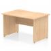 This photo features a dynamic panel end desk from the Impulse collection, measuring 1200 x 800mm. It boasts a scalloped edge and a maple top, with sturdy panel end legs for support. The sleek design creates a professional and modern look in any office space.