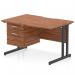 The Dynamic Pedestal Desk Impulse is a sleek and modern workstation, featuring a scalloped edge and straight walnut top with a sturdy black cantilever leg. It also includes a convenient fixed pedestal with two drawers for added storage space.
