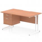 The image shows a dynamic pedestal desk in an office setting. The desk has a scalloped edge and measures 1400 x 800mm, with a beech wood top and white cantilever legs. There is also a fixed pedestal with two drawers attached to the desk. The overall look is modern and professional.