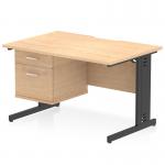 The Dynamic Pedestal Desk features a scalloped edge, maple top, and black cable managed leg for a sleek and functional workspace. It also includes a fixed pedestal with two drawers for added storage.