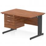 This photo features a dynamic pedestal desk with a scalloped edge and a walnut top. The black cable managed leg adds a sleek touch to the straight office desk. Additionally, there is a 2 drawer fixed pedestal included for storage.