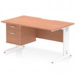 This photo shows a dynamic pedestal desk measuring 1400 x 800mm with a scalloped edge and a beech top. The workstation features a white cable managed leg and comes with a 2 drawer fixed pedestal. The clean lines and modern design make it a great addition to any office space.