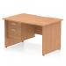 This picture shows a dynamic pedestal desk in the Impulse design, measuring 1200 x 800mm. The desk features a scalloped edge and a straight oak top panel. It also includes a panel end leg workstation and a fixed pedestal with 2 drawers.