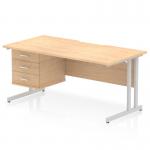 This photograph shows a dynamic pedestal desk with scalloped edges and a straight maple top. The silver cantilever leg gives it a modern look. There is also a 3 drawer fixed pedestal included for storage.