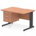 This photo features a sleek and modern Dynamic Pedestal Desk Impulse, measuring 1200 x 800mm. The desk has a scalloped edge design and a smooth beech top. Its black cable managed leg creates a clean and organized workstation. The desk also comes with a 3 drawer fixed pedestal for added storage.