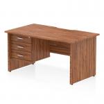 This photograph showcases a beautifully designed dynamic pedestal desk. The desk features a 1400 x 800mm walnut top panel with a scalloped edge, supported by panel end legs. A 3 drawer fixed pedestal adds practical storage space to this stylish workstation.