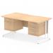 In the photo, a sleek and modern Dynamic Pedestal Desk Impulse is showcased. It features a scalloped edge straight office desk made of maple wood, with a white cantilever leg workstation. There is a 2 drawer and 3 drawer fixed pedestal attached for storage. The overall look is clean and professional.