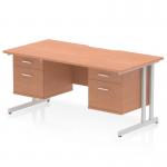 This photo shows a Dynamic Pedestal Desk Impulse with a 1600 x 800mm scalloped edge beech top, supported by silver cantilever legs. It also features a 2 x 2 drawer fixed pedestal for storage. The modern design and sleek finish make it a functional and stylish addition to any office space.