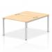 A sleek and modern office setup, this 2-person bench desk features a silver frame and maple wood desktop. The dynamic design promotes collaboration and productivity.