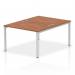 The dynamic bench desking features a stunning Impulse Bench B2B with a modern 2 person setup and a sleek 1200 silver frame. The office bench desk boasts a classic walnut finish, making it a stylish addition to any workspace.