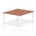 Two sleek, modern white desks with walnut tops sit side by side on a sturdy white frame. Each desk has its own built-in filing cabinet and plenty of space for two people to work comfortably. The design is clean and functional, perfect for a stylish and efficient office space.