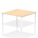 This picture features a sleek and modern Dynamic Bench DeskingImpulse Bench B2B, comfortably seating two people. The 1600 white frame and maple desk allow for a clean and professional look, perfect for any office space.