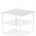 This photo features a modern, stylish office bench desk with a sleek white frame. The dynamic design allows for two people to comfortably work together. Perfect for a professional and efficient workspace.