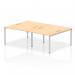 This picture shows a modern and sleek white bench desk with silver framing, designed for dynamic and collaborative working. The 4-person set-up and maple finish add warmth to any modern office space.