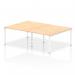 The picture shows a dynamic bench desking setup, featuring the Impulse Bench B2B with four individual workstations. The white frame of the office bench desk contrasts elegantly with the traditional maple finish. A perfect solution for a modern and collaborative workspace.