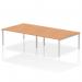 This picture features a sleek, modern bench desk designed for team collaboration. It has a silver frame and is made of oak. The dynamic design and spacious surface can comfortably accommodate up to 4 people. Perfect for a contemporary office space.