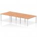 This image features a sleek and modern Dynamic Bench Desking Impulse Bench B2B that comfortably accommodates 6 people. The bench has a silver frame and is made of durable oak, providing a stylish addition to any office space.