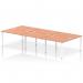 This photo features a modern and stylish Dynamic Bench Desking Impulse Bench B2B with a 6 person capacity. The 1200 white frame and sleek beech finish make it perfect for any office space.