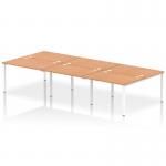 The impressive Dynamic Bench Desking Impulse Bench B2B features a sleek 6 person design with a 1200 White Frame and stylish Oak IB00181 top. This modern office bench desk is perfect for any workspace.