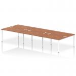 The image shows a spacious, modern bench desking system with a white frame and a sleek walnut desktop. It features 6 workstations with plenty of room for collaboration and productivity. The dynamic design is perfect for any professional office setting.