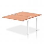 In the photo, the Dynamic Bench Desking Impulse Bench B2B Ext Kit 1200 is shown with a sleek white frame and a functional office bench desk in a warm beech finish. The desk offers ample room for work and includes integrated storage space, making it a great choice for a modern and efficient work environment.