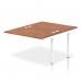 The photograph shows a sleek and modern Dynamic Bench Desking Impulse Bench B2B Ext Kit. It features a white frame, with a rich walnut desk surface. The overall design is perfect for any office space seeking a stylish and functional workspace.
