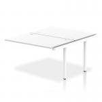 The photo shows a sleek and modern dynamic bench desking setup, with Impulse Bench B2B extensions and a 1200 white frame. The office bench desk is white and has a professional and clean appearance.