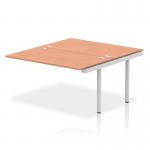 This image showcases a sleek and modern bench desk, featuring a silver frame and a lovely beech finish. The dynamic design allows for a versatile workspace, making it perfect for any office setting.