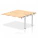 The picture shows a modern and versatile Dynamic Bench Desking Impulse Bench B2B Ext Kit with a sleek silver frame, paired with a spacious maple office bench desk. The Impulse Bench is designed to increase collaboration and productivity in any office setting.