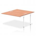 The picture shows a sleek, modern bench desk with a white frame and a smooth beechwood top. The desk is part of the Dynamic Bench Desking Impulse series and features additional B2B extender kit for extra workspace.