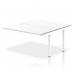 A modern white office bench desk with a sleek and stylish design. The dynamic bench desking offers a spacious and versatile workspace, perfect for any office setting. This B2B extension kit adds additional desk space to the Impulse Bench, making it ideal for collaborative work environments.