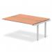 The picture captures a sleek and modern office bench desk with a silver frame and a rich, warm beech wood top. The dynamic design of the desk allows for versatile usage in a professional setting.