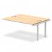 The Dynamic Bench Desking Impulse Bench B2B Ext Kit 1600 features a sleek silver frame and a sturdy office bench desk. Its maple finish adds a touch of warmth while the modern design exudes professionalism. The spacious desk offers ample workspace and the dynamic bench allows for versatile seating options.