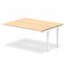 A sleek and modern office space complete with a dynamic bench desking system. The bench desk features a white frame and a sleek maple tabletop, perfect for a professional and contemporary workspace.