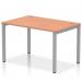 A sleek and modern office setup with a single row of Impulse Bench Desking. The silver frame adds a touch of sophistication as the beautiful beech desk provides ample workspace. Perfect for any collaborative or individual work environment.