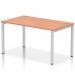 This picture shows a sleek and modern silver-framed bench desk with a beech surface. The dynamic design features a single row of seats, perfect for a modern office space. The Impulse Bench Desking ensures a functional workspace while maintaining a stylish look.