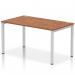 The vibrant and functional Dynamic Bench Desking Impulse Bench features a sleek silver frame and a rich walnut office bench desk. Its single row layout allows for optimal productivity in any modern workspace.
