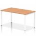 This photograph features a sleek and modern Dynamic Bench Desking Impulse Bench with a single row of 1400 white frame office desks. The desks are topped with oak surfaces, creating a professional yet inviting workspace.