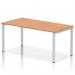 The photo captures a sleek and modern office space featuring a single row of Dynamic Bench Desking Impulse Benches. The 1600 Silver Frame beautifully complements the Oak desk, creating a contemporary and stylish workspace.