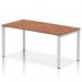 The image shows a sleek and modern Dynamic Bench Desking Impulse Bench with a silver frame and a single row of desks. The desks are made of walnut, creating a warm and inviting atmosphere. This office bench desk, perfect for collaboration and teamwork, measures 1600mm in length.